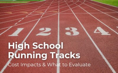 High school running track with numbered lanes, emphasizing cost impacts and evaluation considerations for athletic field construction.